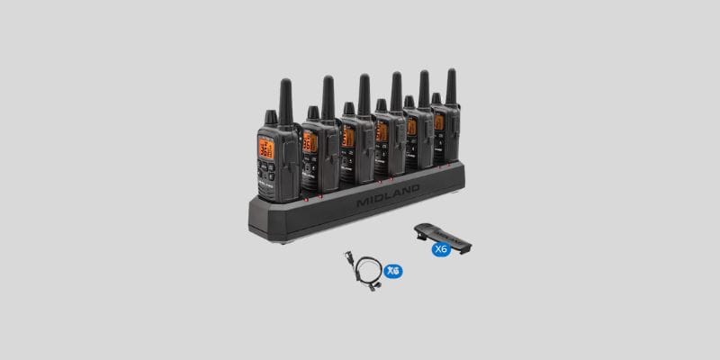 Midland LXT600BBX6 business long range walkie talkies 1000 miles, black, 6-pack with headsets on charging base, featuring 36 channels and NOAA weather alerts.