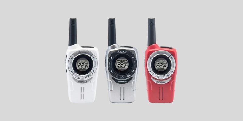 Cobra ACXT360 water resistant walkie talkie 3 pack featuring rechargeable two-way radios with 22 channels and a 25-mile range, available in white, silver, and red colors.