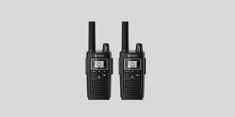 Two black Cobra RX380 walkie talkies with orange accents, featuring digital displays, antennas, and multiple buttons, designed for long range walkie talkies 100 miles communication.